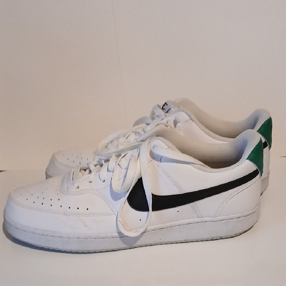 Nike White Sneakers with Black Swoosh and Green Heel